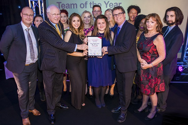 Plan B team receiving award at You Make A Difference Awards