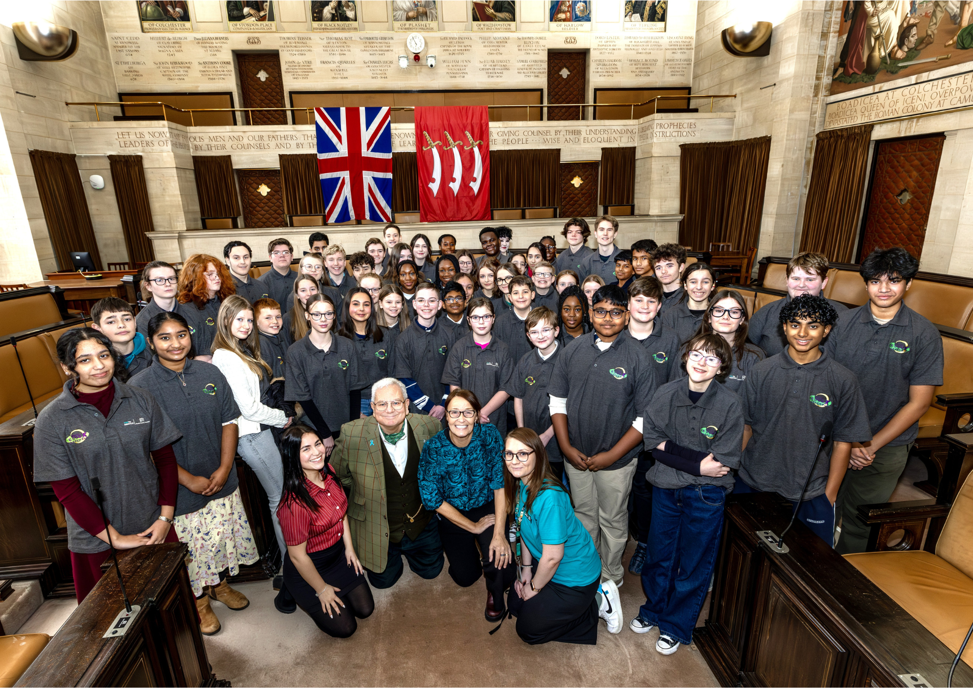 Young Essex Assembly members in a council chamber