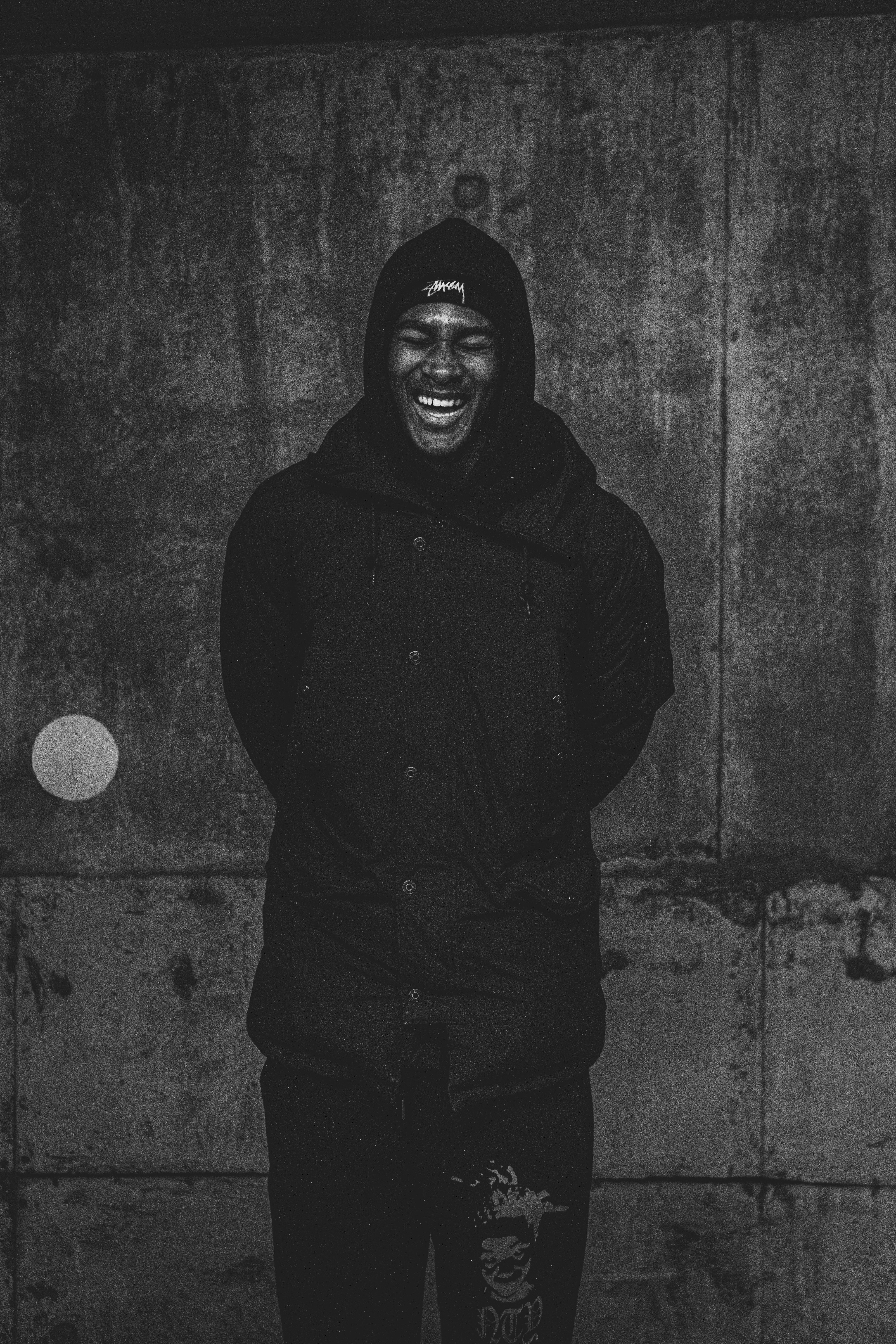 Young man and older man sitting in a stadium